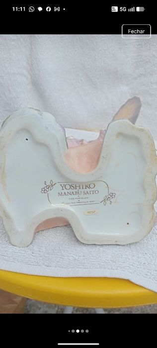 Estatueta de porcelana