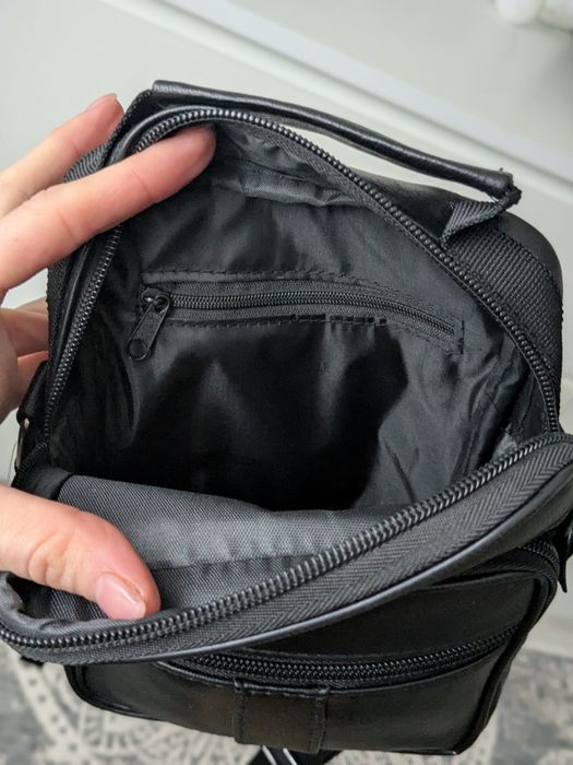 Стильна чоловіча шкіряна сумка з короткою і довгою ручкою