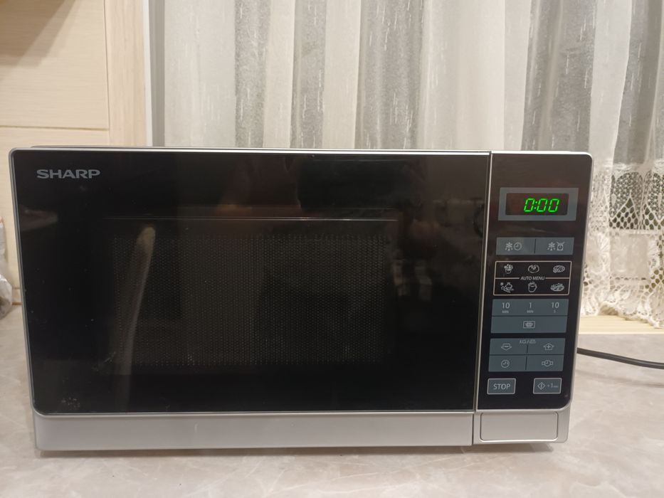Мікрохвильова піч Sharp R 242 та Nord