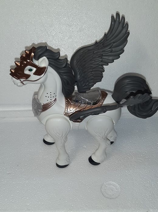 Игрушка  музыкальная  - лошадка  Пегас