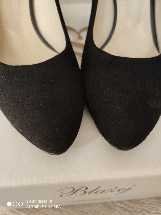 Buty na słupku Błażej