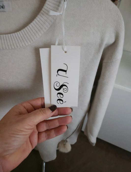 Sweter damski pompony