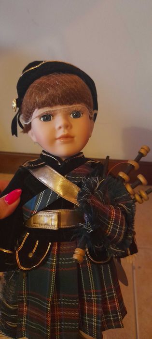 Boneco escocês de porcelana