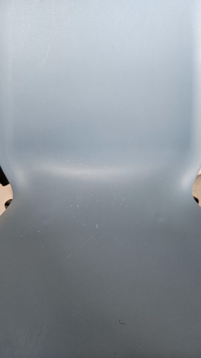 Cadeira azul com almofada