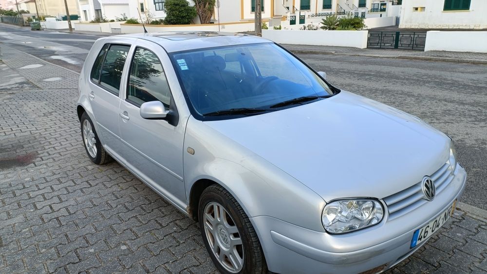 Golf 99 com teto solar