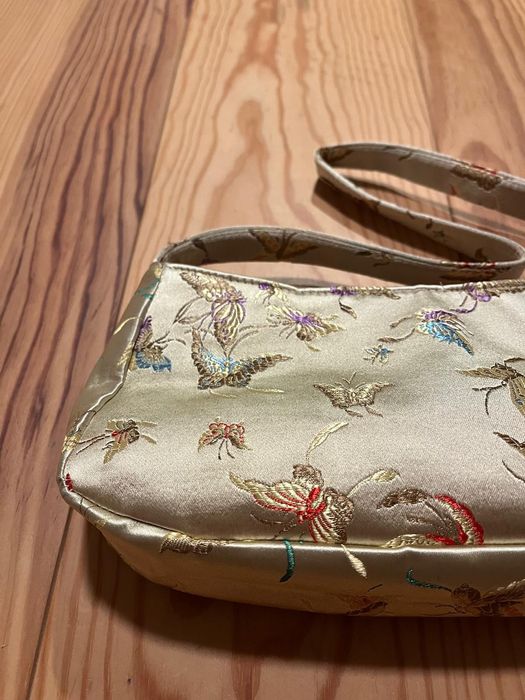 Bolsa pequena com figuras