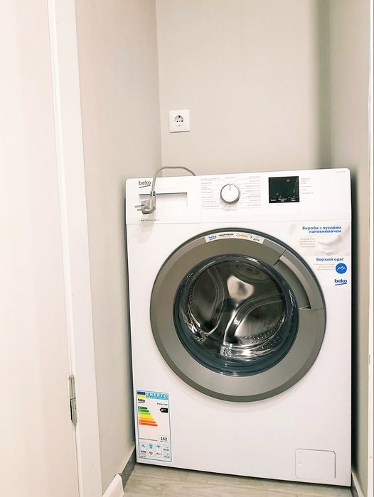 Затишна студія в центрі з балконом і видом на місто