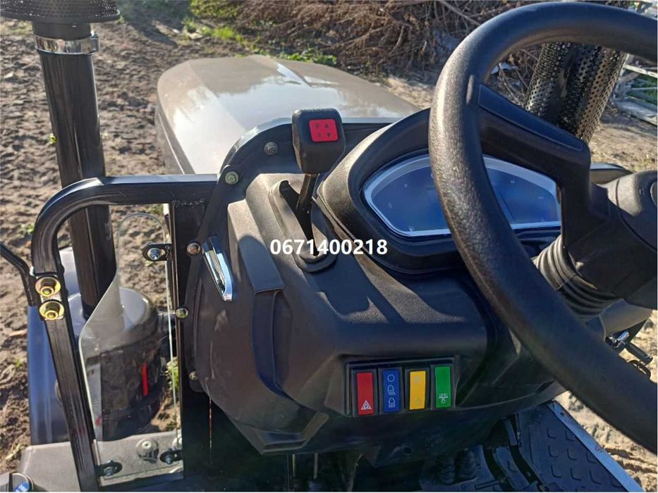 Мінітрактор СКАУТ TY-404 з примусовою реверс біля керма колеса більше