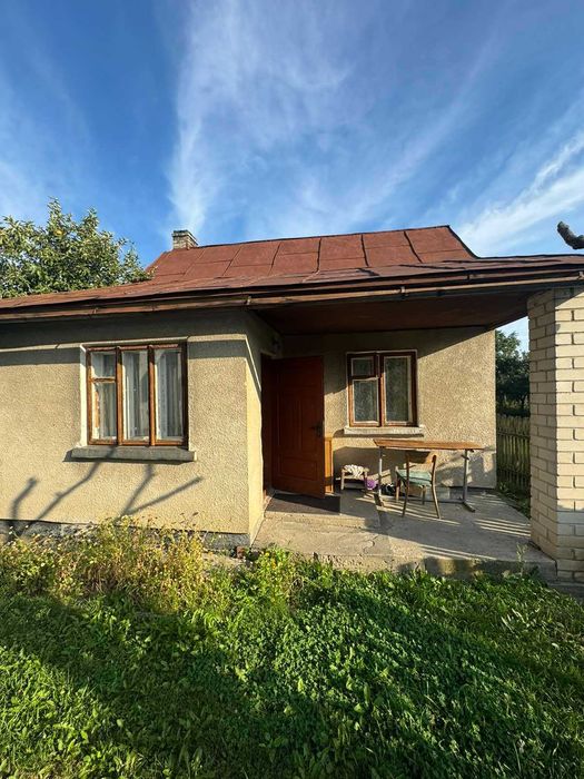 будинок та земельна ділянка 15 сот. смт. Магерів