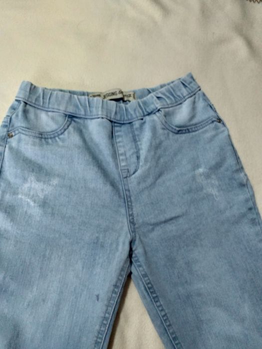 Calças de ganga de menina