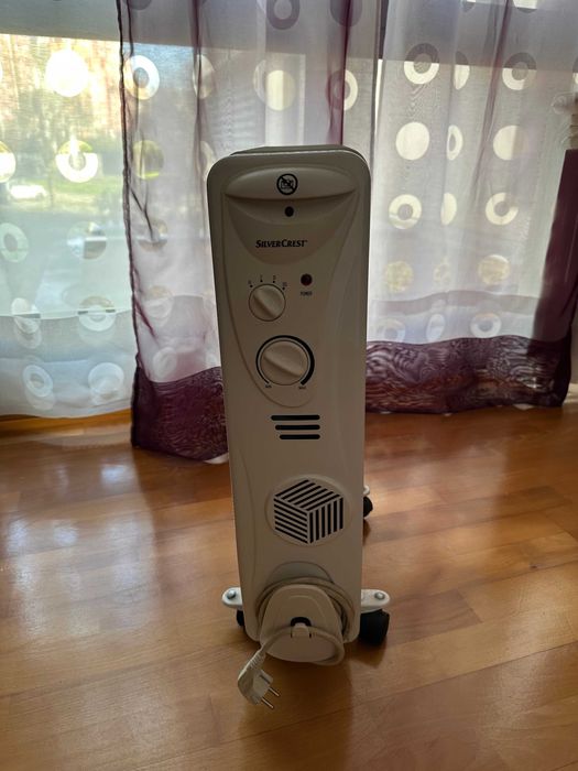 Aquecedor a óleo com ventilação, 8 varetas