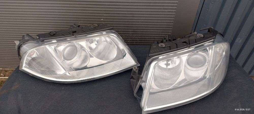 Lampy przód Passat B5 lift Hella P+L