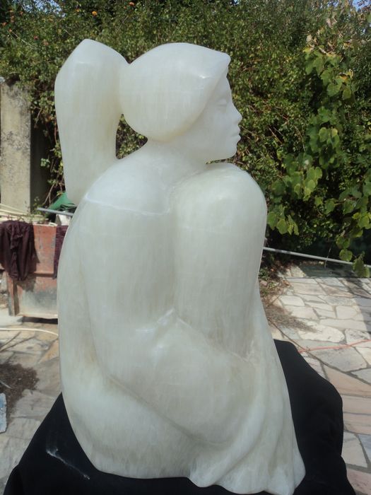 Escultura em pedra onix