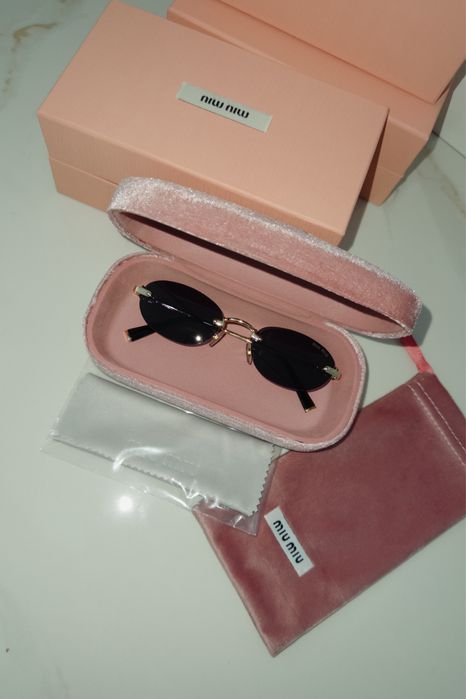 Окуляри MIU MIU