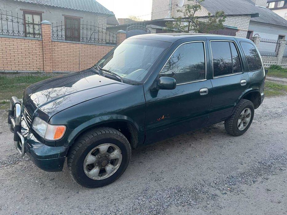 Продам КIA Спортедж 1996 року на повному ходу.до ноября по техпаспорту 2700дол