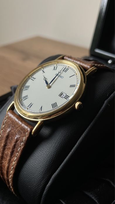 Zegarek Seiko kwarcowy, złoty do garnituru
