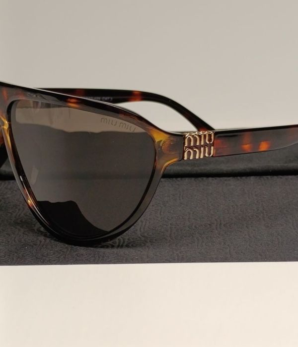 Маска от MIU MIU