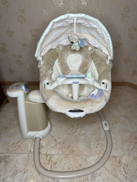 Заколисуючий центр Graco. Укачивающий центр Graco