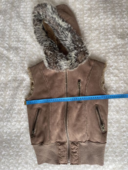 Безрукавка на дівчинку