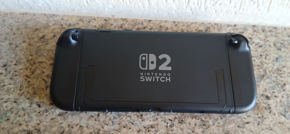 Nintendo switch 2 ,bolsa de viagem, 2 jogos,2 comandos