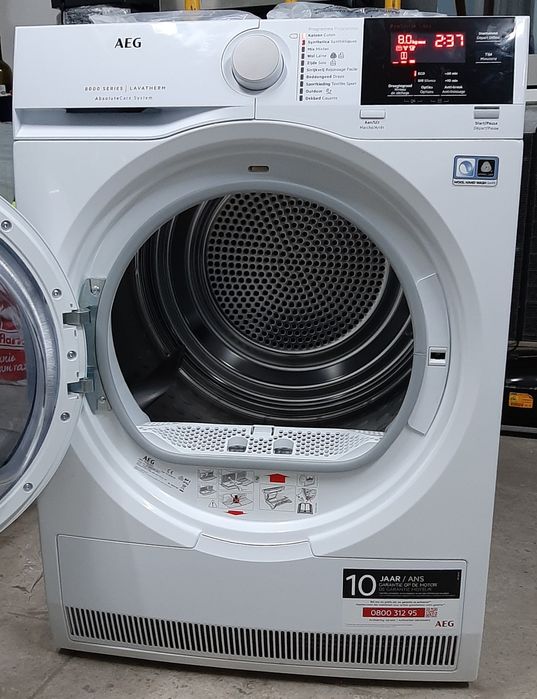 Сушильная машина с тепловым насосом на 8кг АЕГ AEG 8000 Series A++ вживана сушильна машина з тепловим насосом б/в сушарка для одягу made in Germany