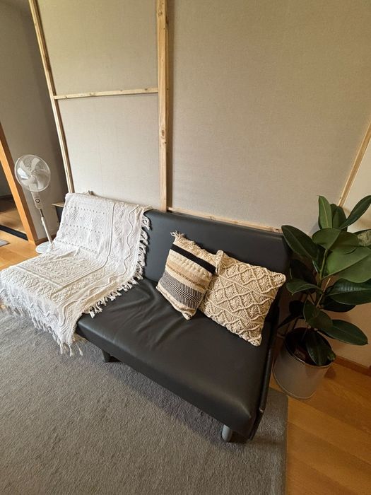 Sofá cama cinzento
