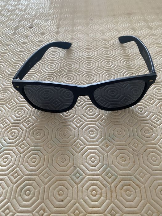 Carteira, pulseiras e oculos