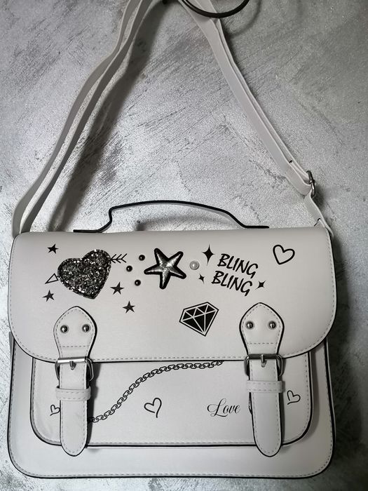 Nowa listonoszka większa z metką