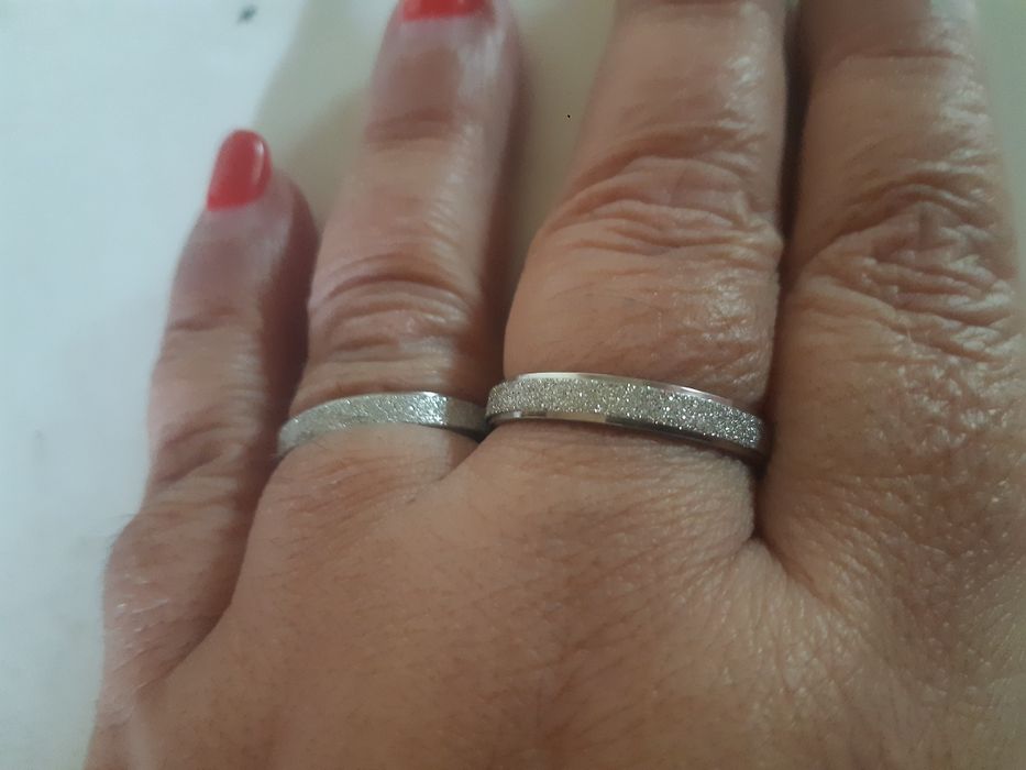 Par de alianças em aço inoxidável novo