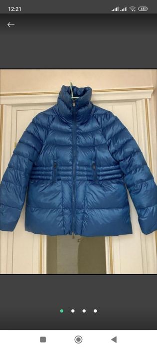 Шикарный пуховик фирмы экле