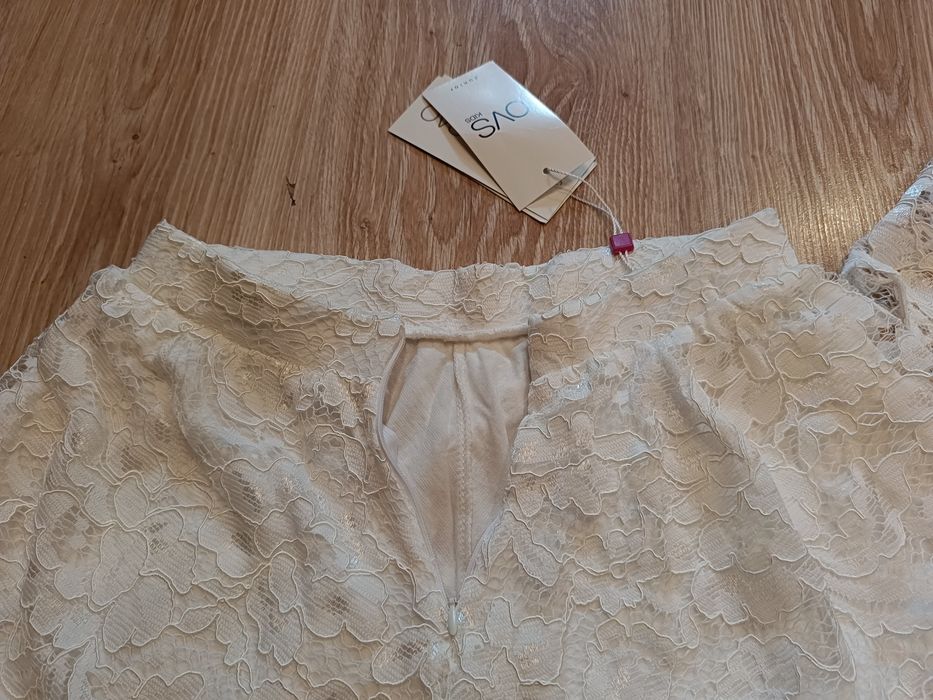 2 koronkowe spódniczki białe OVS r. 140
