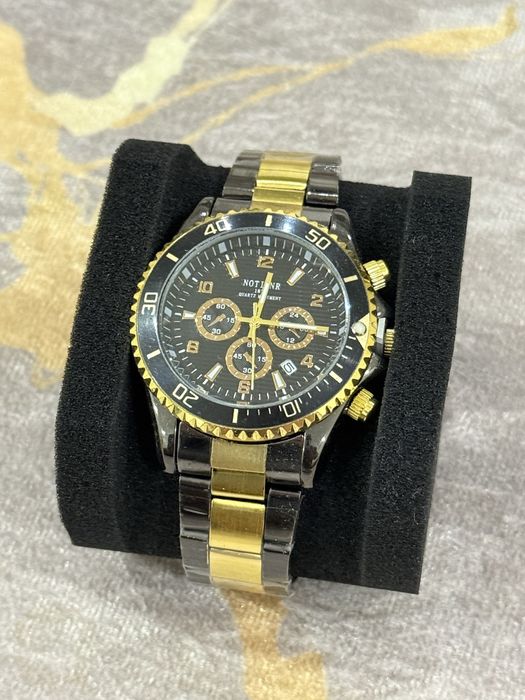 Чоловічий наручний годинник NOTINER Quartz чорний із золотистим