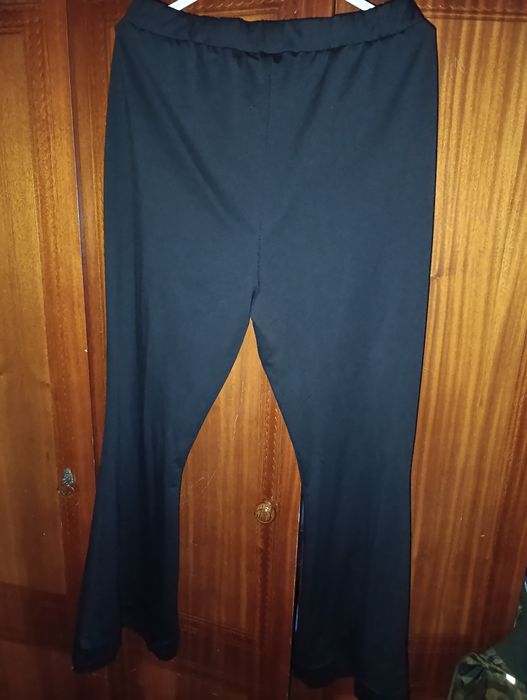 Штани кльош 58-60 розмір чорного кольору