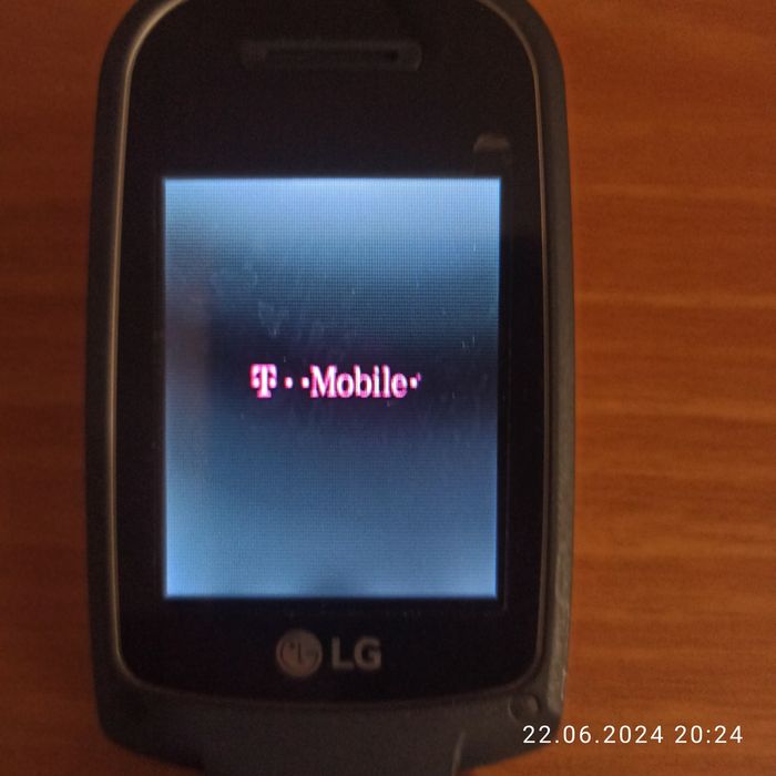 Мобільний телефон - разкладушка LG 450