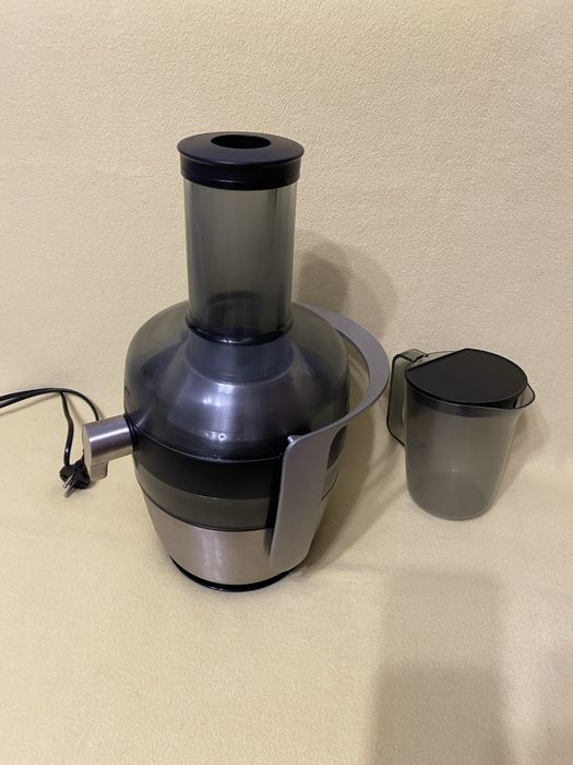 На 1200 Вт Соковыжималка Philips HR1922 соковитискач