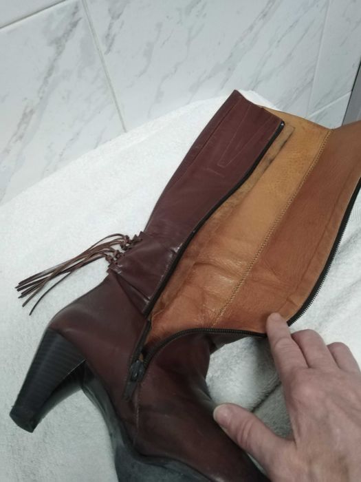 Botas cano alto pele