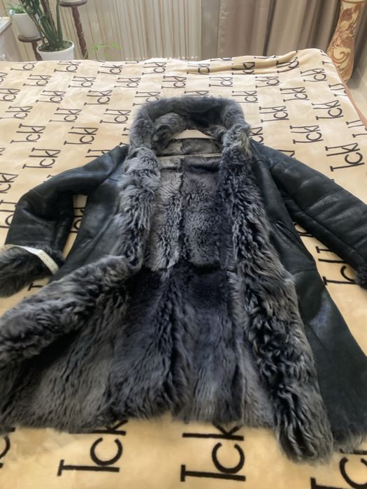 Желетка,яскрава,легенька.