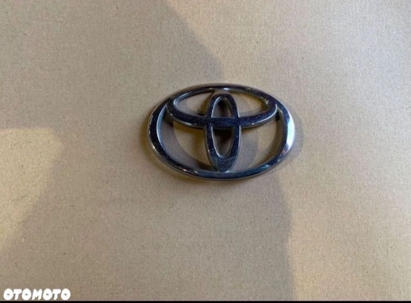 3280T010 emblemat znaczek tylnej klapy Toyota corolla e12