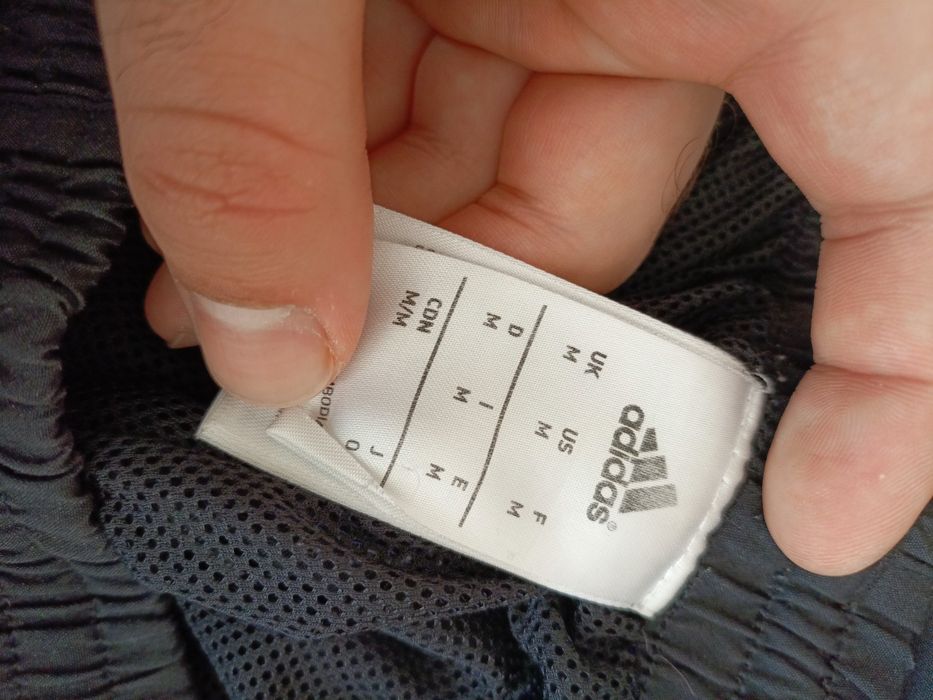 Męskie spodnie dresowe ortalionowe Adidas rozmiar M/L czarne