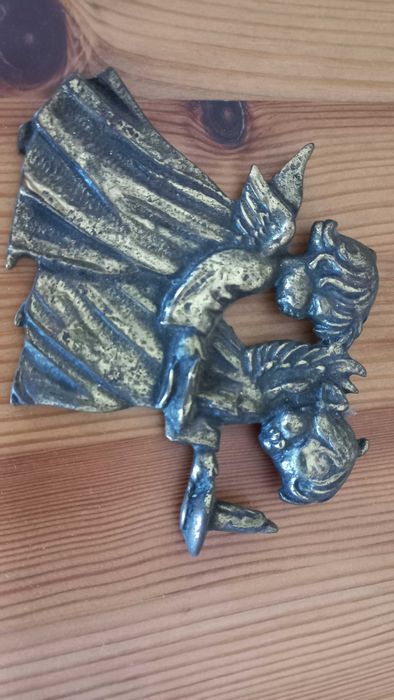 Anjos em  latão  usado