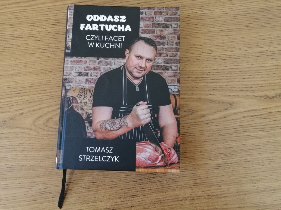 Oddasz fartucha Tomasz Strzelczyk