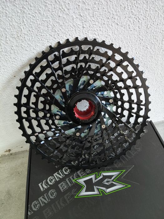 Cassete KCNC 12v 9-52t + corrente XX1 Rainbow + Roldanas GX