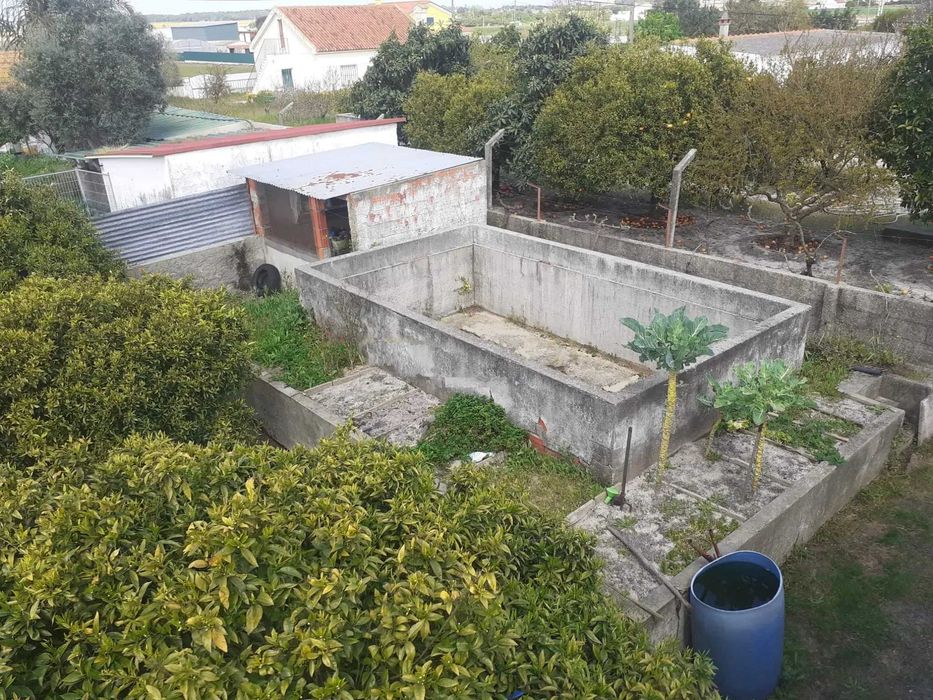 Terreno com Moradia