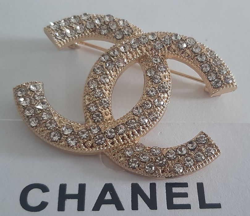 Przepiękna, złota broszka kryształki