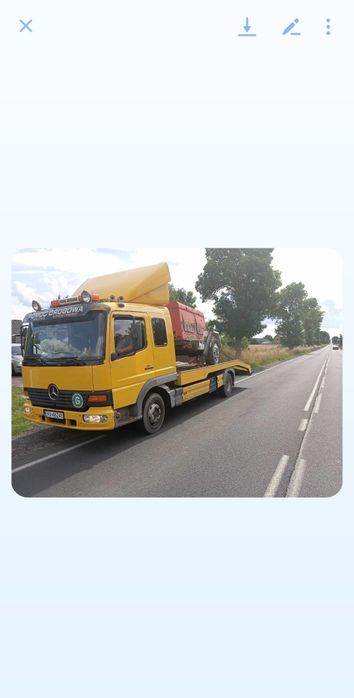 Pomoc drogowa transport maszyn rolniczych laweta