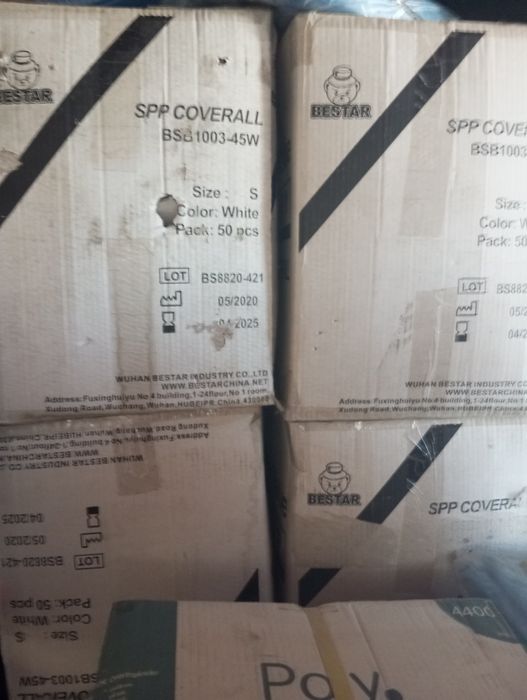 Fatos de proteção TNT caixa de 50 unidades