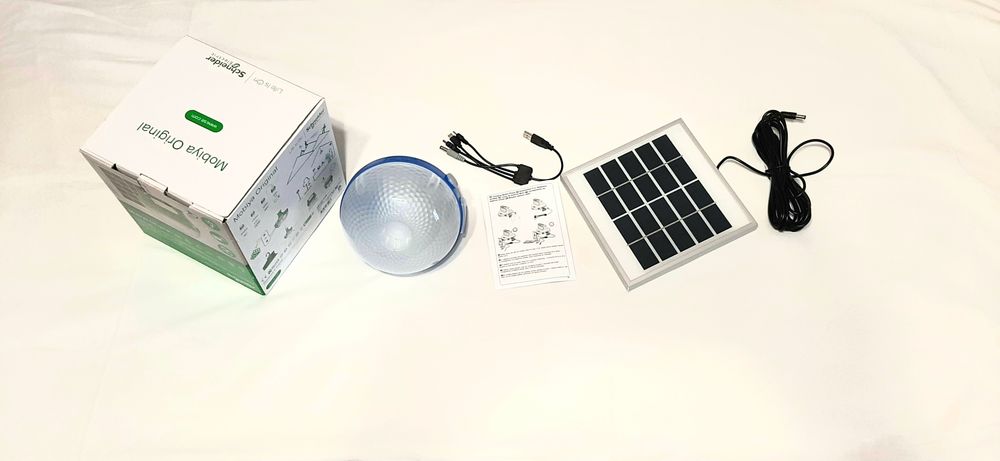 Ліхтар. Лампа. Фонарь. Сонячна панель. Заряд телефона.