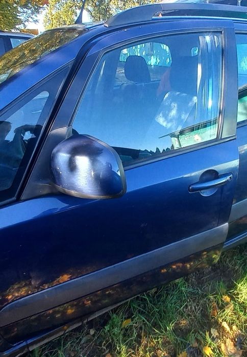 DRZWI PRZEDNIE LEWE SUZUKI SX4 ZCH