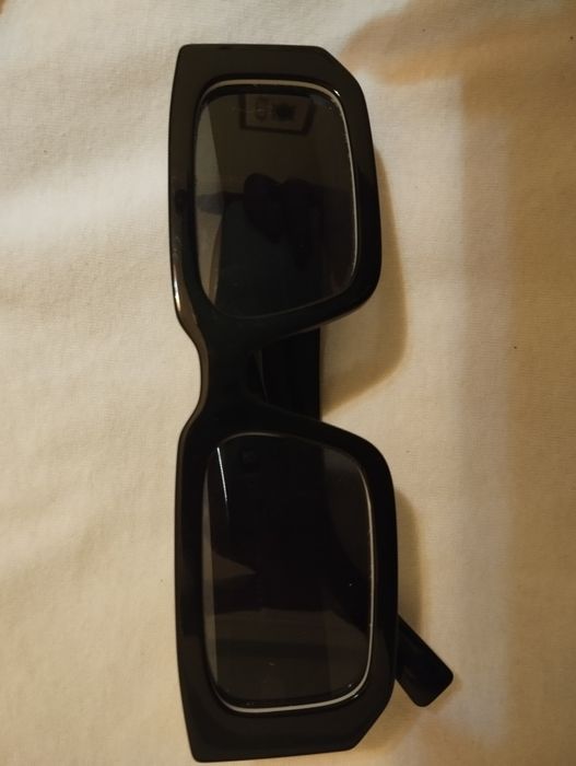 Óculos de sol Prada como novos