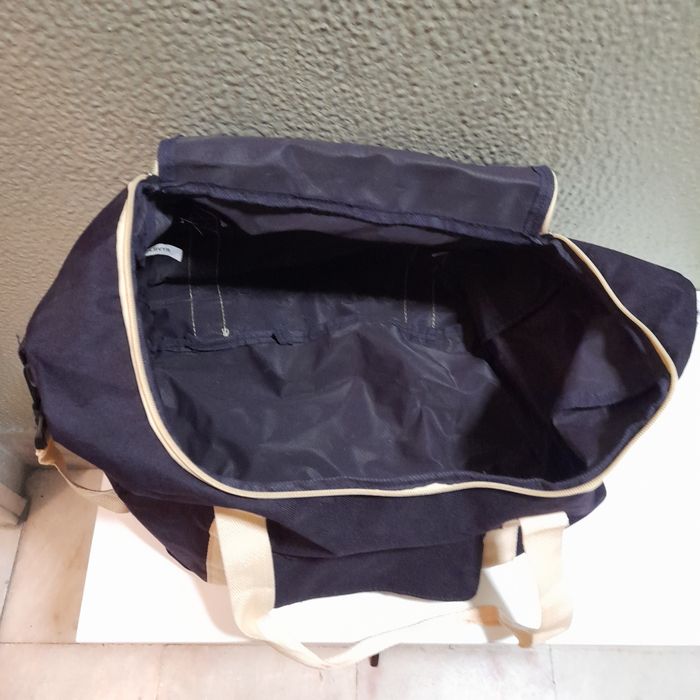 Bolsa utilitária e mala em pele